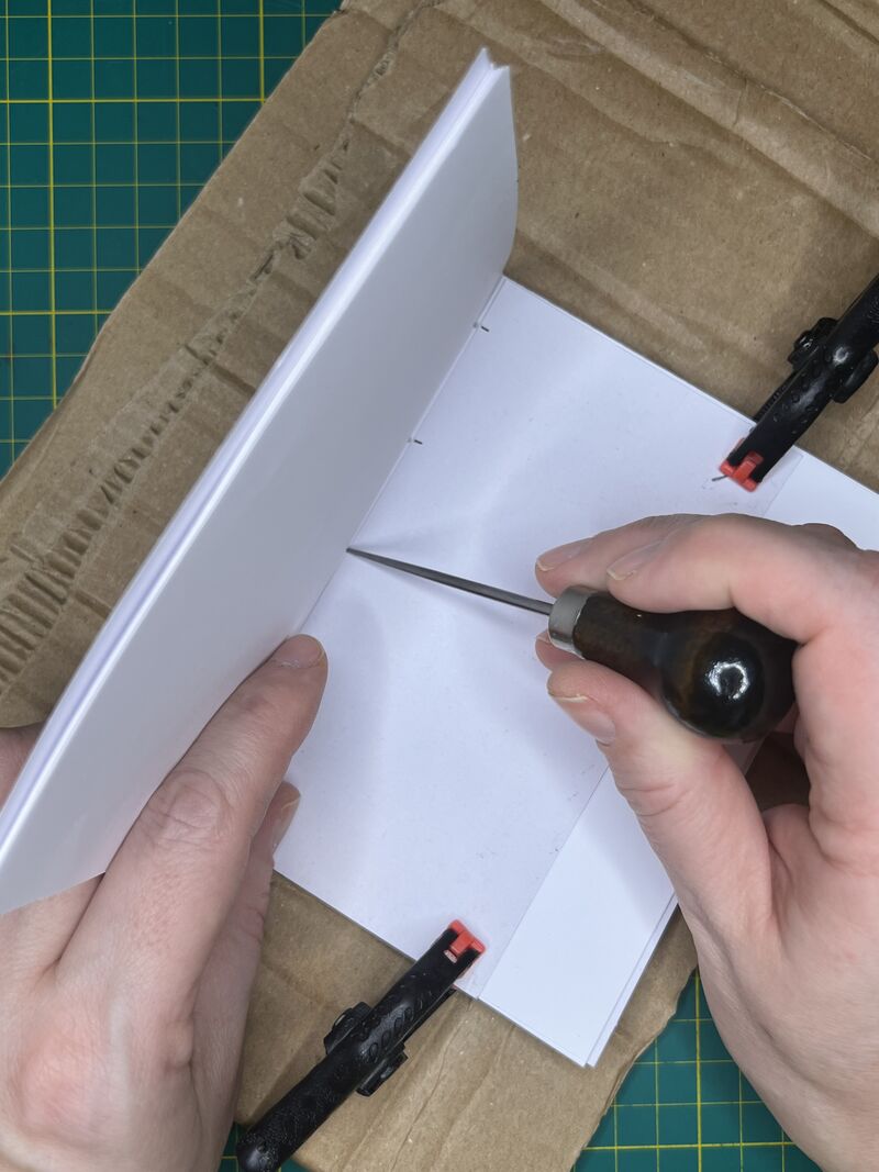 Punching the holes for the stitching